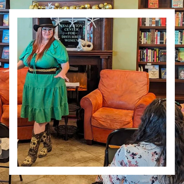Author, Storyteller, and Filmmaker Odessa Blaine giving a performance story at FoxTale Bookshoppe in Woodstock, GA
